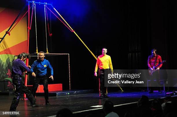 Jeff Fatt, Anthony Field, Greg Page and Murray Cook of The Wiggles perform at Fillmore Miami Beach on August 3, 2012 in Miami Beach, Florida.