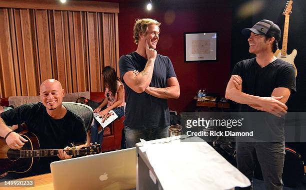 Train's Jimmy Stafford, Scott Underwood and Pat Monahan during recording of A Very Special Christmas 25th Anniversary Album at Blackbird Studio on...