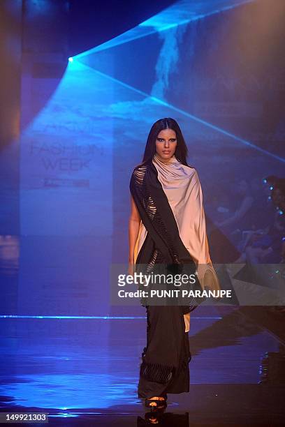 India-fashion-lifestyle-women,FOCUS by Rachel O'Brien This photo taken on August 6, 2012 shows a model showcasing a creation by designers Shivan and...