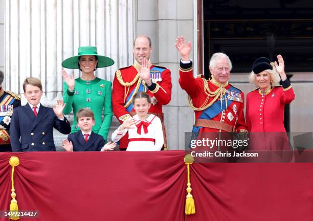 King Charles III and Queen Camilla wave alongside Prince William, Prince of Wales, Prince Louis of Wales, Catherine, Princess of Wales and Prince...