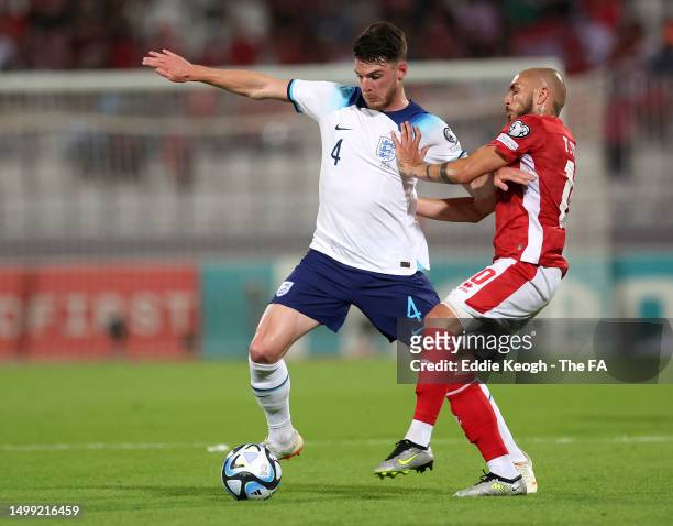 Declan Rice of England battles for possession during the UEFA EURO 2024 qualifying round group C match between Malta and England at Ta' Qali Stadium...