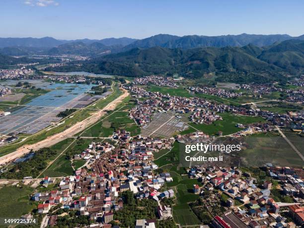 aerial view of idyllic villages and roads - 全景 stock pictures, royalty-free photos & images