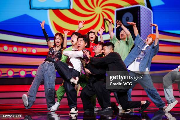 Actor Huang Bo performs on the stage during the closing ceremony of the 25th Shanghai International Film Festival at Shanghai Grand Theatre on June...