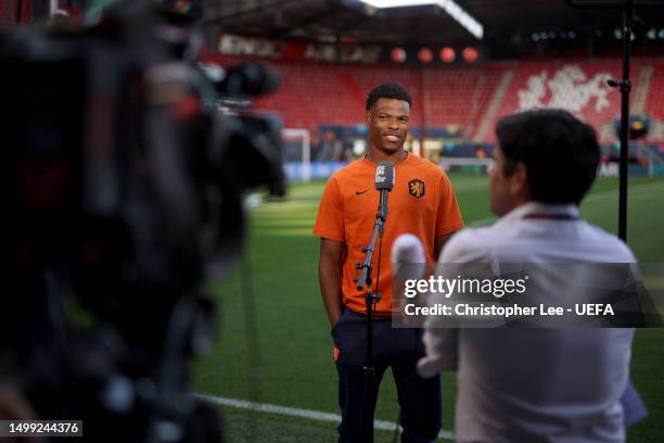 Denzel Dumfries of Netherlands talks to the media during the Netherlands Training Session And Press Conference in the UEFA Nations League 2022/23 at...
