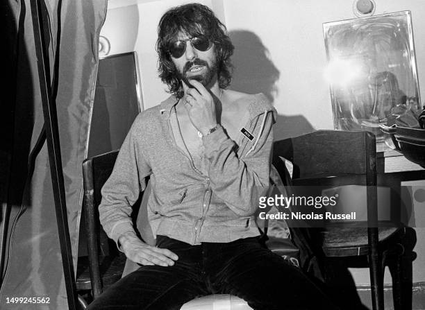 Photograph of American musician and lead vocalist of the J. Geils Band, Peter Wolf, posing for a photo backstage In San Antonio, Texas, in January,...