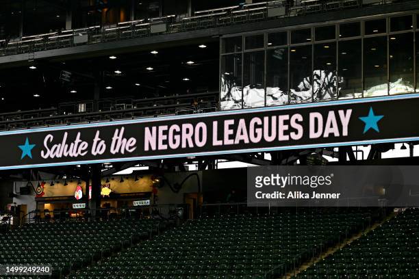 View of the ribbon board displaying "Salute to the Negro Leagues Day" before the game between the Seattle Mariners and the Chicago White Sox at...