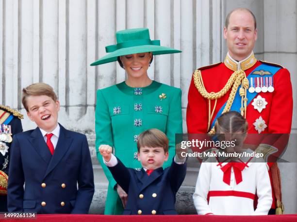 Prince George of Wales, Prince Louis of Wales, Catherine, Princess of Wales, Princess Charlotte of Wales and Prince William, Prince of Wales watch an...