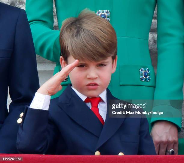 Prince Louis of Wales salutes as he watches an RAF flypast from the balcony of Buckingham Palace during Trooping the Colour on June 17, 2023 in...