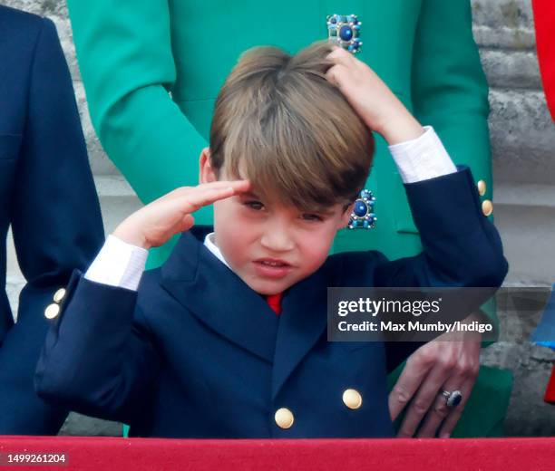 Prince Louis of Wales salutes as he watches an RAF flypast from the balcony of Buckingham Palace during Trooping the Colour on June 17, 2023 in...