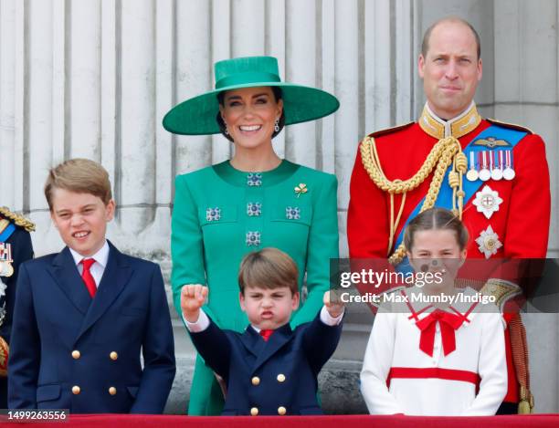 Prince George of Wales, Prince Louis of Wales, Catherine, Princess of Wales, Princess Charlotte of Wales and Prince William, Prince of Wales watch an...