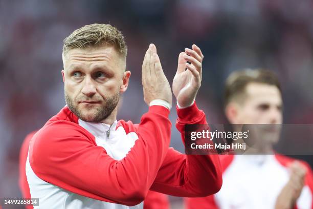 Jakub Blaszczykowski of Poland shows appreciation to the fans during his farewell prior to the international friendly match between Poland and...