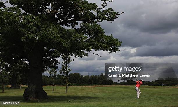 John Dwyer of Ashbourne Golf Club plays a shot from the 12th fairway during day one of the Glenmuir PGA Professional Championship at Carden Park Golf...