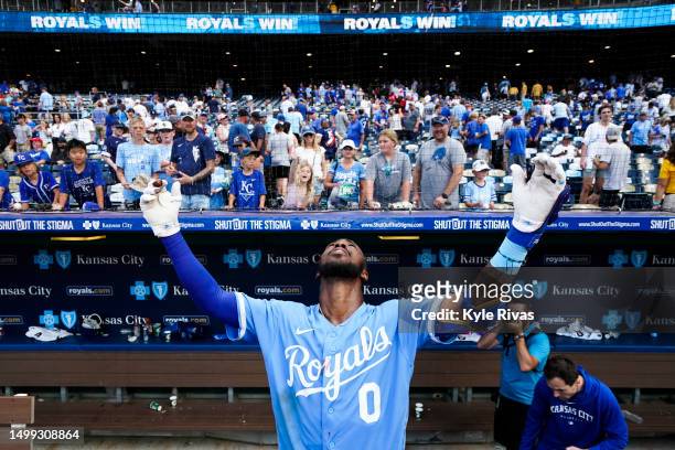 Samad Taylor of the Kansas City Royals celebrates getting his first career hit and the game-winning run during his major league debut defeating the...