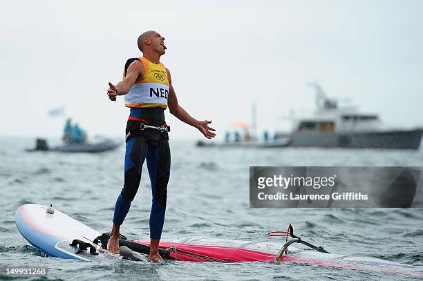 Dorian Van Rijsselberge of Netherlands celebrates after winning gold in the Men's RS:X Sailing on Day 11 of the London 2012 Olympic Games at the...