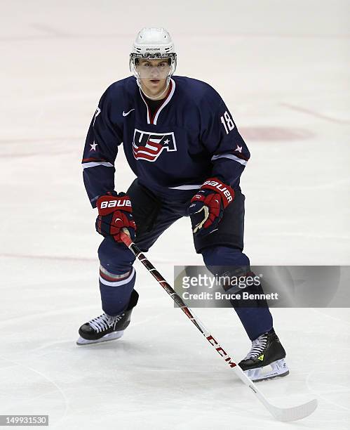 Nick Kerdiles of the USA Blue Squad skates against Team Finland at the USA hockey junior evaluation camp at the Lake Placid Olympic Center on August...