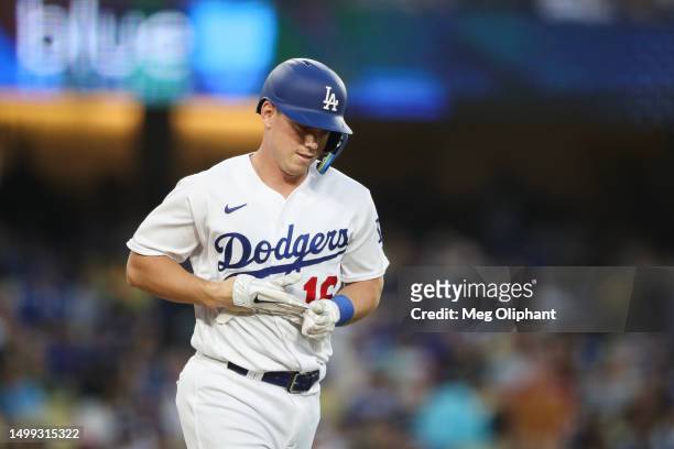 Will Smith of the Los Angeles Dodgers walks to first base in the third inning against the San Francisco Giants at Dodger Stadium on June 16, 2023 in...