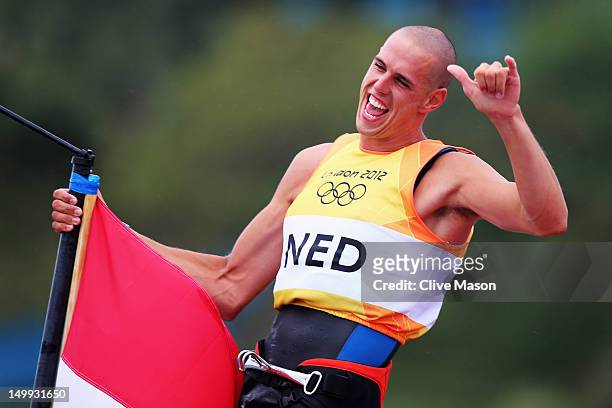 Dorian Van Rijsselberge of Netherlands celebrates after winning gold in the Men's RS:X Sailing on Day 11 of the London 2012 Olympic Games at the...
