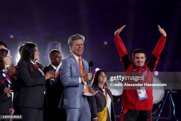 Special Olympics chairman Timothy Shriver reacts with a Syrian Athlete during his speak at the opening ceremony of the Special Olympics World Games...