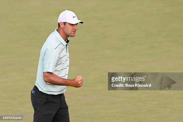 Scottie Scheffler of the United States reacts to his putt on the 18th green during the third round of the 123rd U.S. Open Championship at The Los...