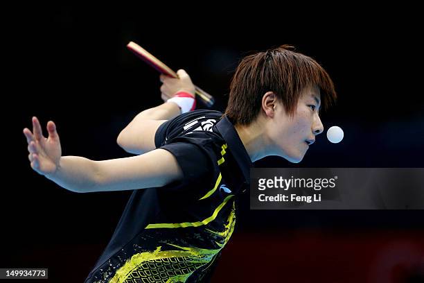 Ning Ding of China competes against Kasumi Ishikawa of Japan during the Women's Team Table Tennis gold medal match on Day 11 of the London 2012...