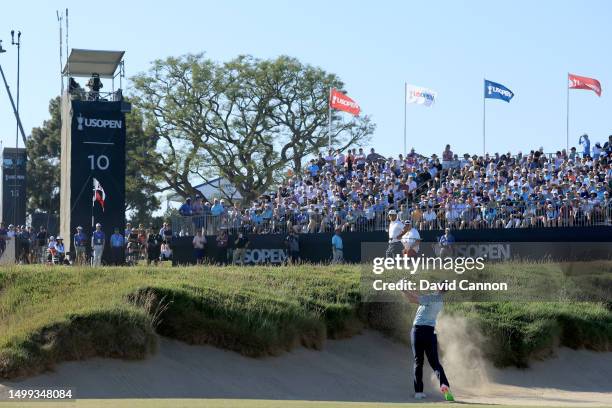 Rory McIlroy of Northern Ireland plays his third shot on the 10th hole during the third round of the 123rd U.S. Open Championship at The Los Angeles...