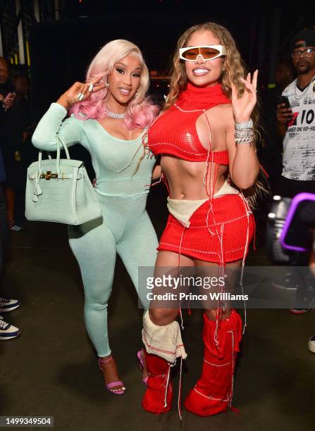 Cardi B and Latto backstage at the Hot 107.9 Birthday Bash 2023 at State Farm Arena on June 17, 2023 in Atlanta, Georgia.