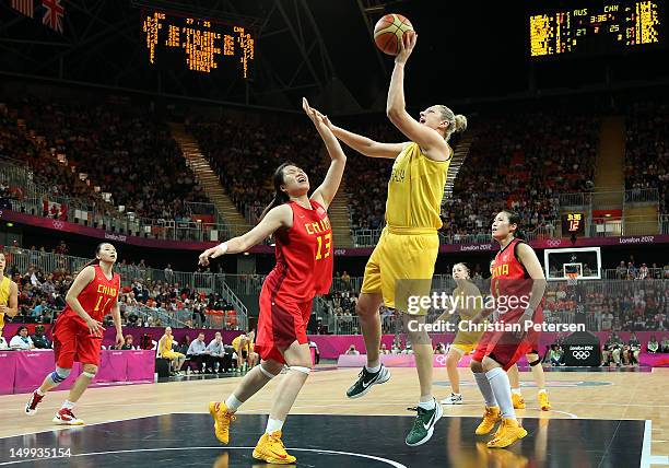 Suzy Batkovic of Australia puts up a shot over Xiaoli Chen of China during the Women's Basketball quaterfinal on Day 11 of the London 2012 Olympic...