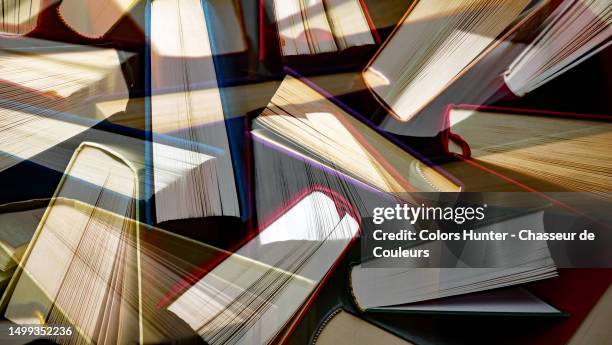 anonymous books mixed together and photographed in double exposure in paris, france - paris library stockfoto's en -beelden