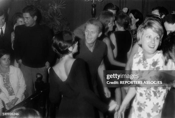 Actor Steve McQueen in Paris dancing with his wife Neile Adams on September 17, 1964 in Paris, France.