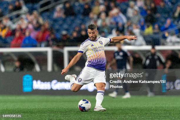 Felipe Martins of Orlando City SC takes a shot during a game between Orlando City SC and New England Revolution at Gillette Stadium on June 17, 2023...
