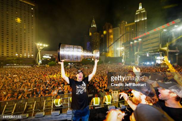 Mark Stone celebrates with the Stanley Cup during a victory rally for the Vegas Golden Knights outside T-Mobile Arena on June 17, 2023 in Las Vegas,...
