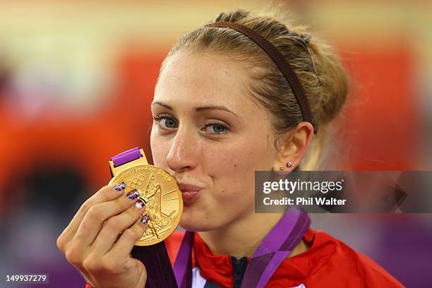 Gold medallist Laura Trott of Great Britain celebrates during the medal ceremony for the Women's Omnium Track Cycling on Day 11 of the London 2012...