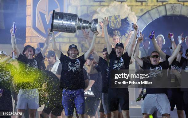 Jack Eichel, Mark Stone, Brayden McNabb and Ivan Barbashev of the Vegas Golden Knights celebrate with the Stanley Cup onstage during a victory parade...