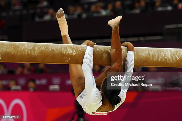 Gabrielle Douglas of the United States falls off the beam during the Artistic Gymnastics Women's Beam final on Day 11 of the London 2012 Olympic...