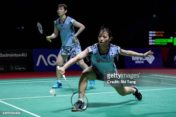 Yuki Fukushima and Sayaka Hirota of Japan compete in the Women's Doubles Final match against Baek Ha Na and Lee So Hee of Korea on day six of the...
