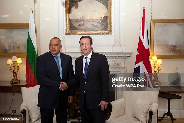 British Prime Minister David Cameron shakes hands with Bulgarian Prime Minister Boyko Borisov inside number 10 Downing street on August 07, 2012 in...