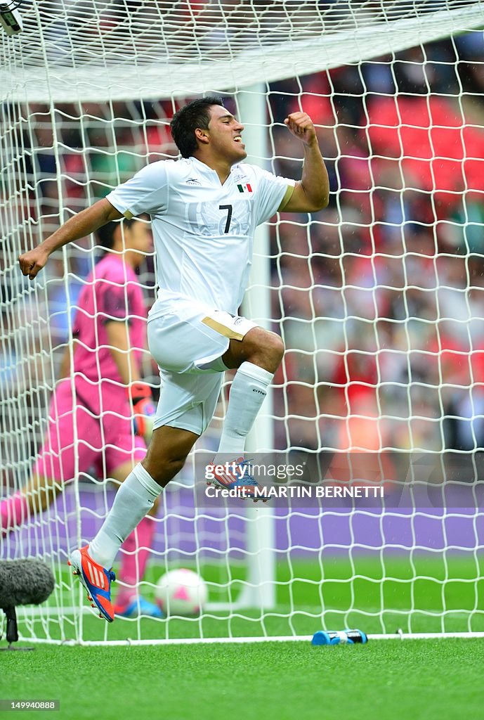 Mexico's midfielder Javier Cortes celebr