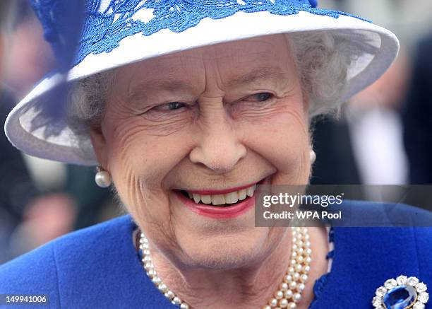 Queen Elizabeth II attends a Garden Party at Balmoral Castle, on August 07, 2012 in Aberdeenshire, Scotland.
