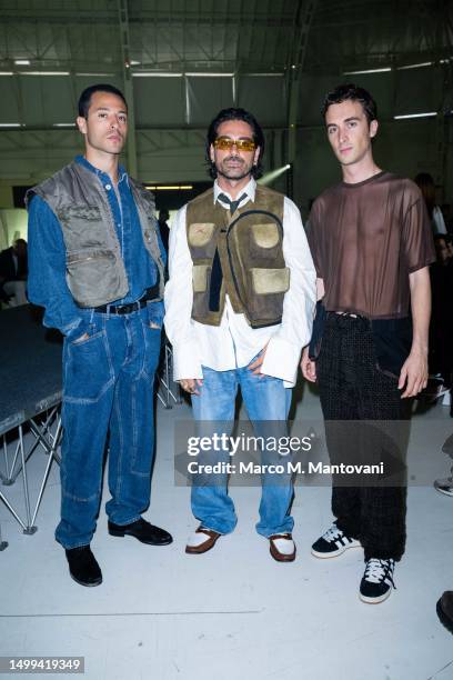 Giuseppe Gioffre, Giotto Calendoli and Mattia Stanga pose on the front row at the Magliano Spring/Summer 2024 fashion show during the Milan Fashion...