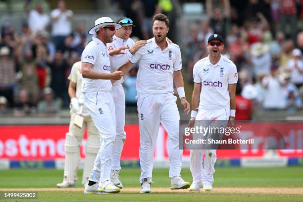 Ollie Robinson of England celebrates bowling Usman Khawaja of Australia with team mates during Day Three of the LV= Insurance Ashes 1st Test match...