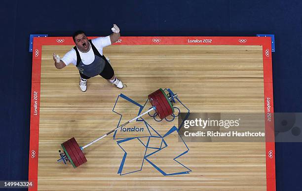 Sajjad Anoushiravani Hamlabad of Iran reacts during the Men's +105kg Weightlifting final on Day 11 of the London 2012 Olympic Games at ExCeL on...