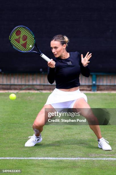 Ana Bogdan of Romania plays a forehand to Rebecca Marino of Canada in a qualifying match during day two of the Rothesay Classic Birmingham at...