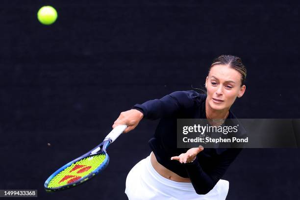 Ana Bogdan of Romania serves to Rebecca Marino of Canada in a qualifying match during day two of the Rothesay Classic Birmingham at Edgbaston Priory...