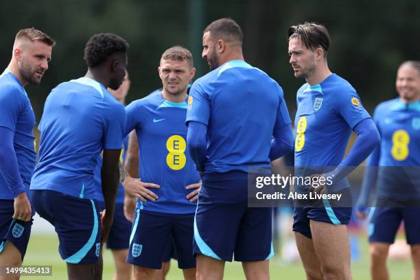 Players of England talk during a training session at Carrington Training Ground on June 18, 2023 in Manchester, England.