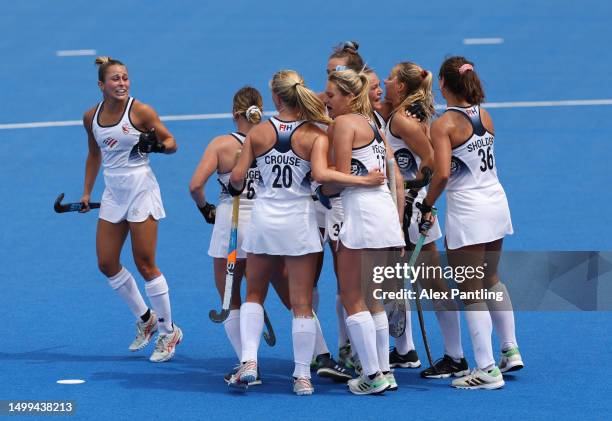 Abigail Tamer of The United States celebrates with team mates after scoring her teams first goal during the FIH Hockey Pro League Women's match...