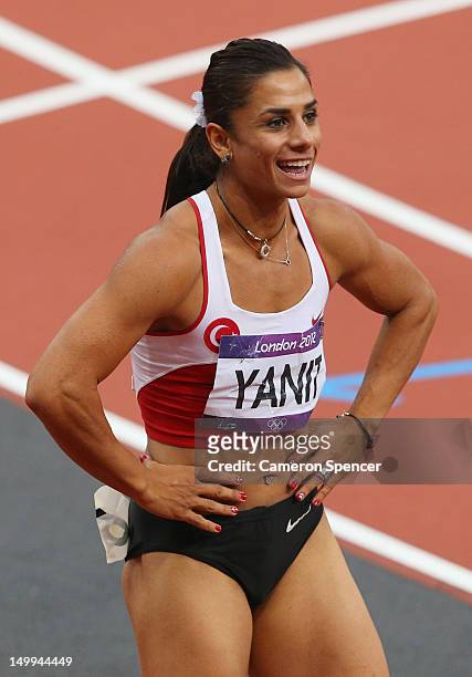 Nevin Yanit of Turkey looks on after competing in the Women's 100m Hurdles Semifinals on Day 11 of the London 2012 Olympic Games at Olympic Stadium...