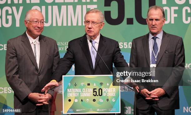 Secretary of the Interior Ken Salazar, Senate Majority Leader Harry Reid and Pattern Energy's Mike Garland attend a news conference during the...
