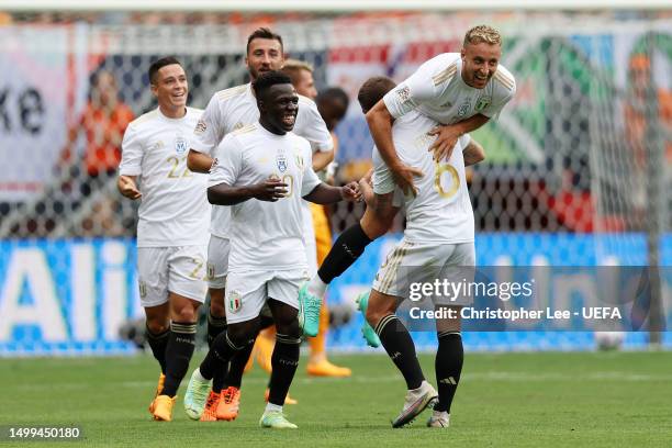 Davide Frattesi of Italy celebrates with teammate Marco Verratti after scoring the team's second goal during the UEFA Nations League 2022/23...