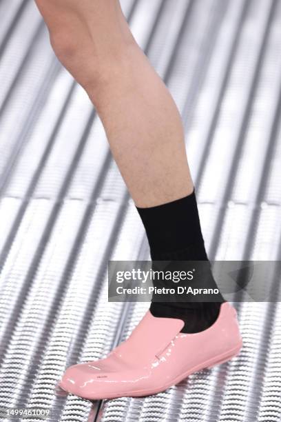 Model, shoe detail, walks the runway at the Prada Spring/Summer 2024 fashion show during the Milan Fashion Week menswear spring/summer 2024 on June...