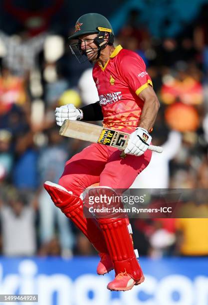 Craig Ervine of Zimbabwe celebrates after reaching their century during the ICC Men's Cricket World Cup Qualifier Zimbabwe 2023 match between...